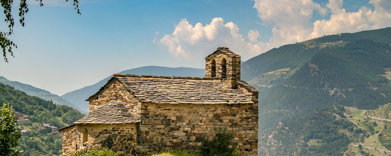 Stone church above a mountain valley in Andorra