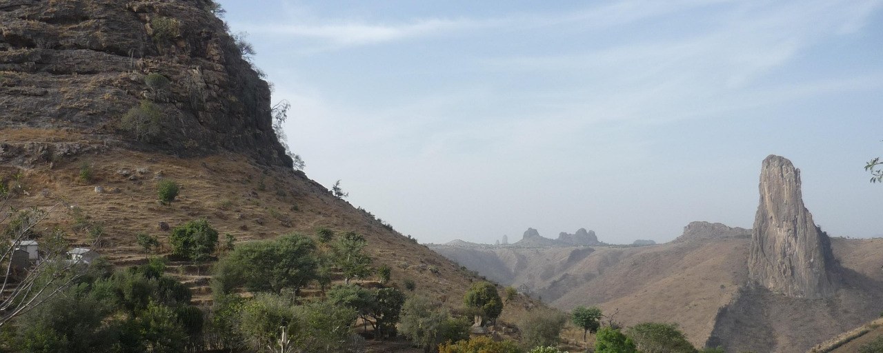 Rock formations rising above the landscape of Rumsiki, Cameroon.