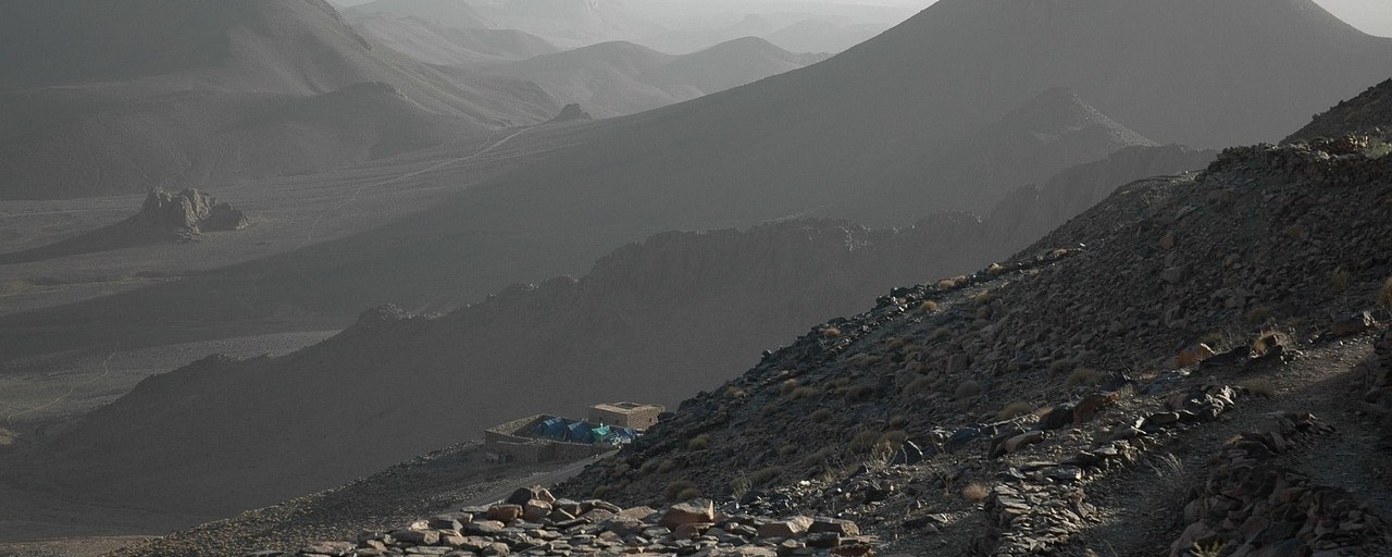Rugged Hoggar mountains fading into haze near Assekrem, Algeria