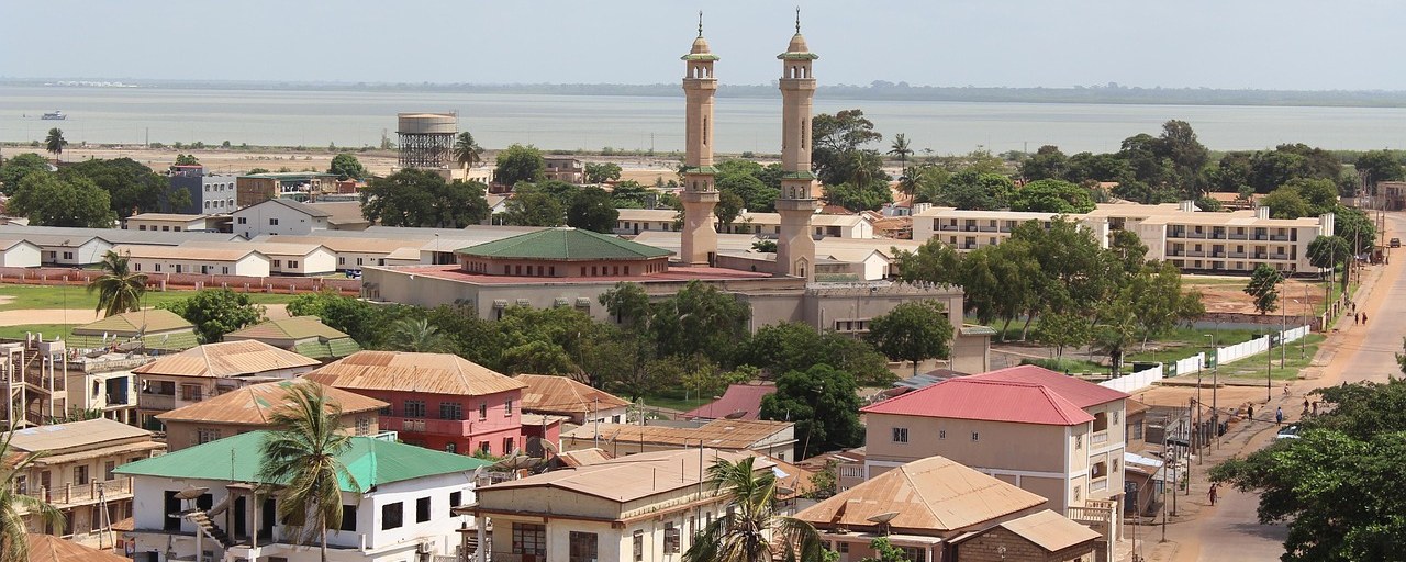 Banjul rooftops and mosque minarets beside the coast in Gambia