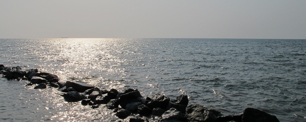 Sunlight on the rocky shoreline at Bata, Equatorial Guinea