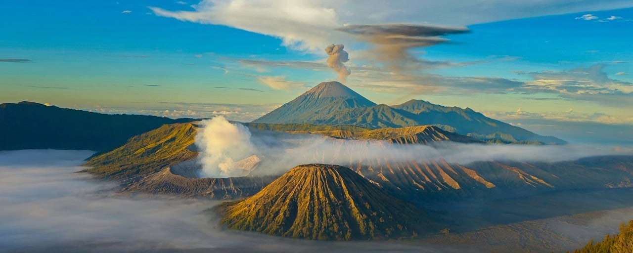 Volcanoes and morning mist in the Bromo Tengger Semeru landscape, Indonesia