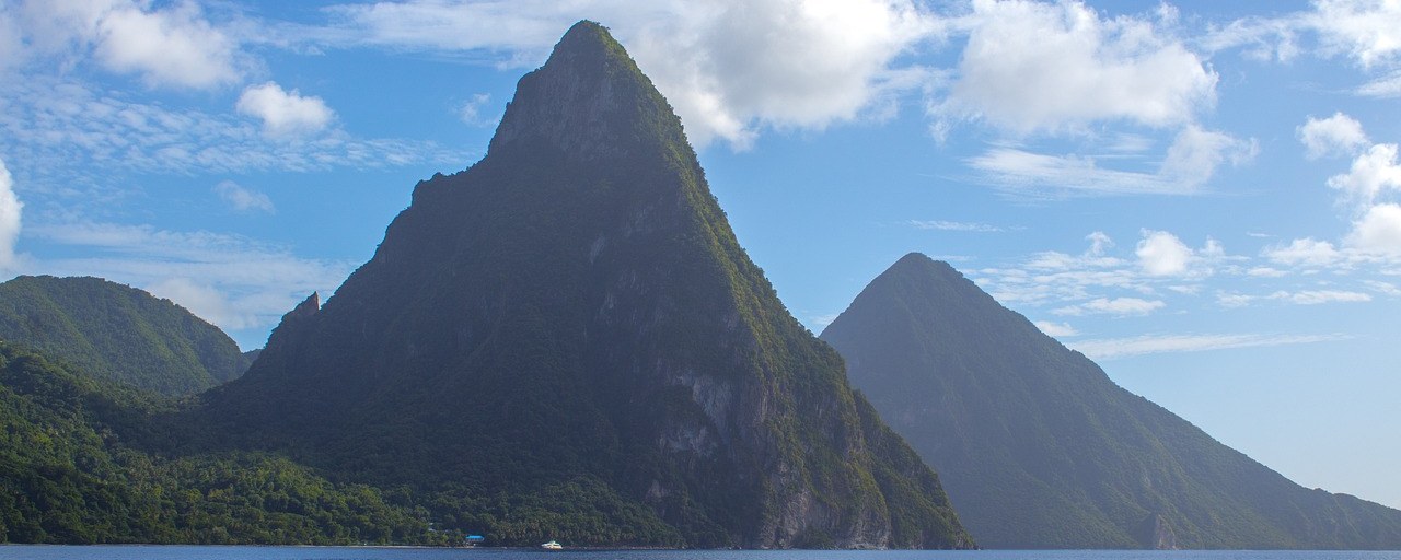 The Pitons rising above the sea in Saint Lucia