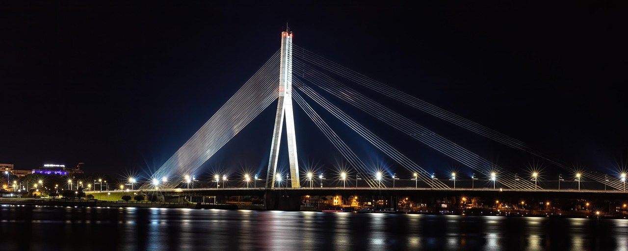 Illuminated Vanšu Bridge over the Daugava River in Riga, Latvia