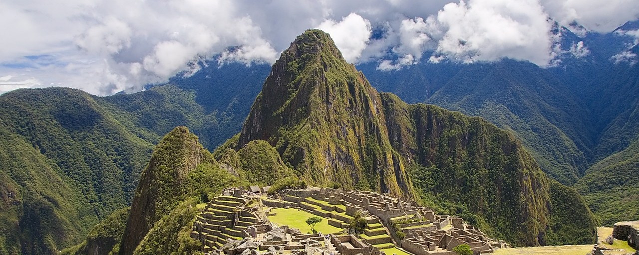 Machu Picchu ruins and mountain peaks, Peru