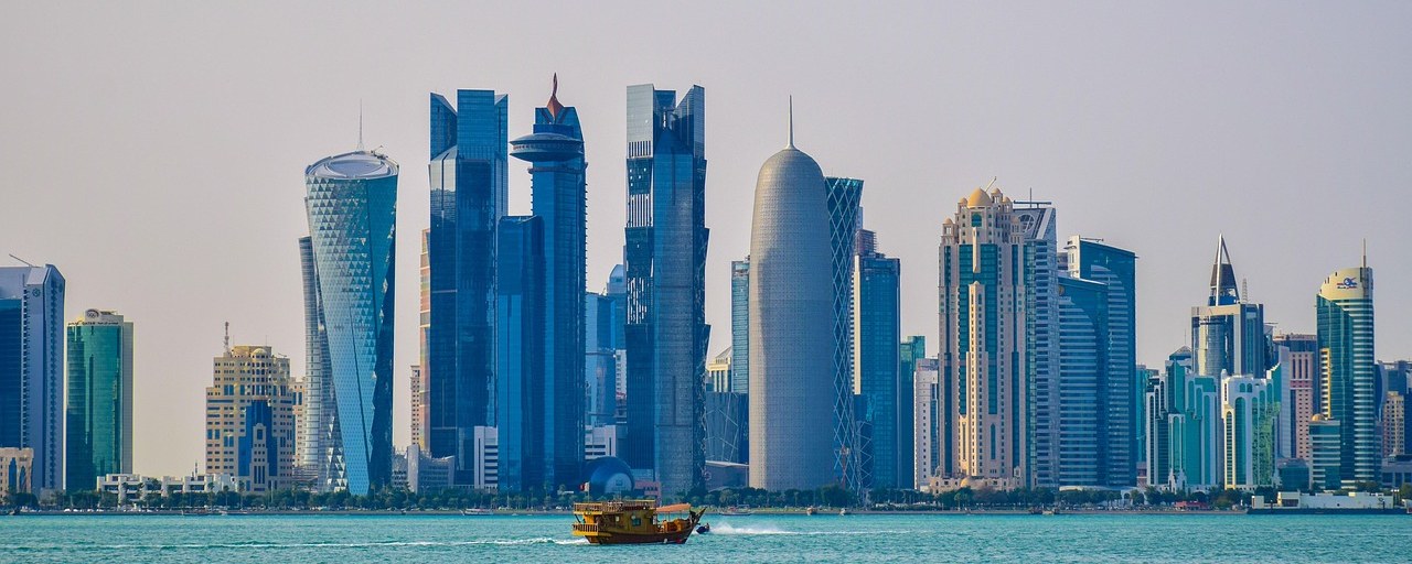 West Bay skyline and a dhow in Doha, Qatar