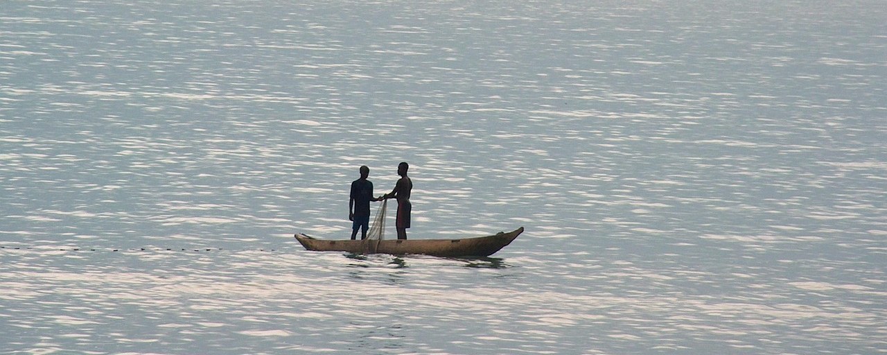 Distant fishermen in a canoe off São Tomé and Príncipe