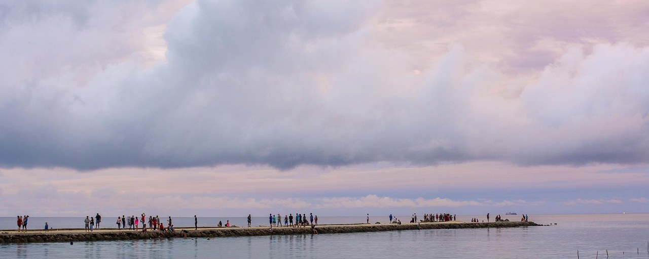 Waterfront pier under evening clouds in Nuku'alofa, Tonga