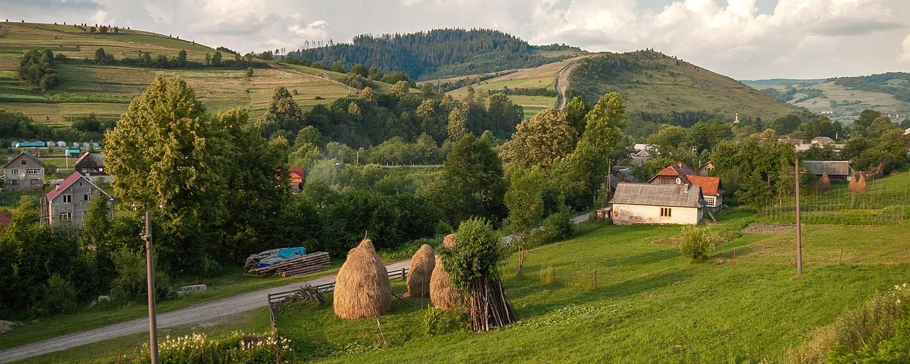 Village and haystacks in the Carpathian Mountains, Ukraine