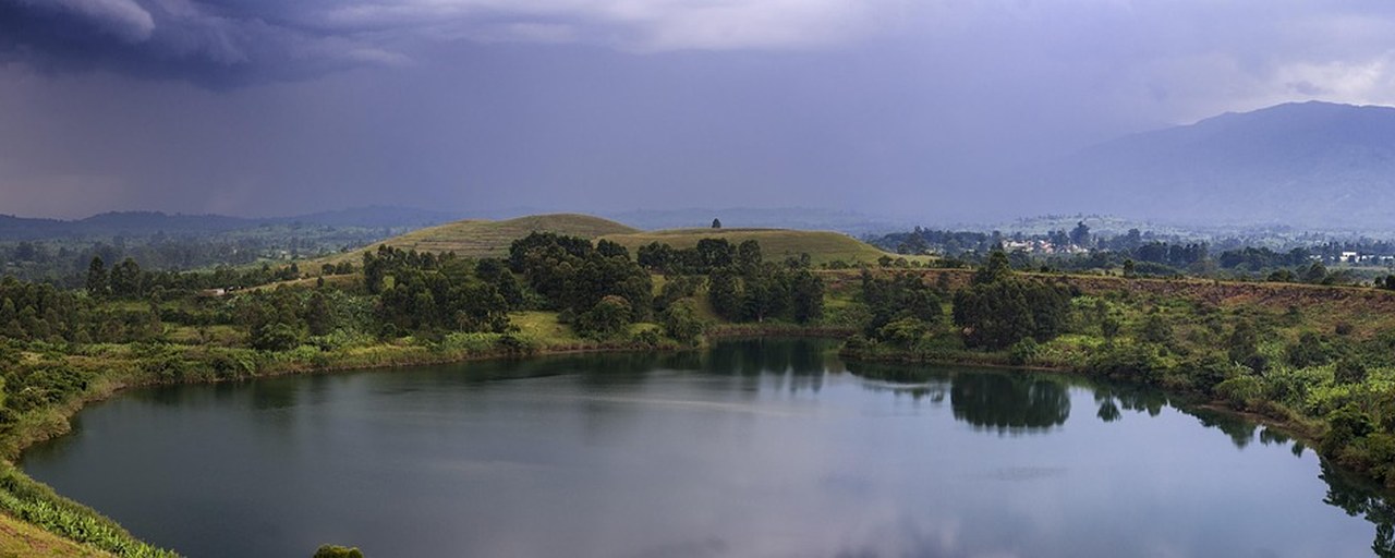 Crater lake near Fort Portal with the Rwenzori Mountains, Uganda