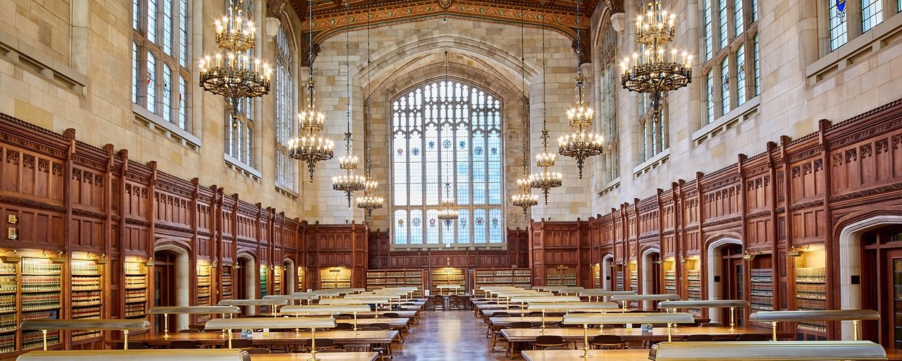 Reading tables and bookshelves inside a historic law library